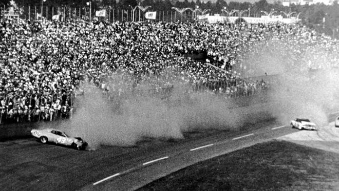 The famous last-lap crash between Richard Petty and David Pearson during the 1976 Daytona 500.