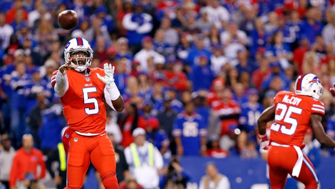 Buffalo Bills quarterback Tyrod Taylor (5) throws a pass during the first quarter against the New York Jets at New Era Field.