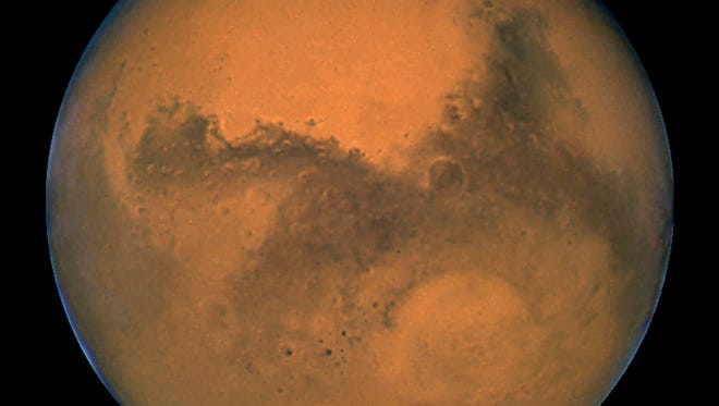 This image released 27 August, 2003 captured by NASA's Hubble Space Telescope shows a close-up of the red planet Mars when it was just 34,648,840 miles away.