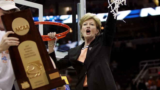 Summitt celebrates after cutting down the net after Tennessee's 59-46 win against Rutgers to win the 2007 NCAA  championship at Quicken Loans Arena in Cleveland.