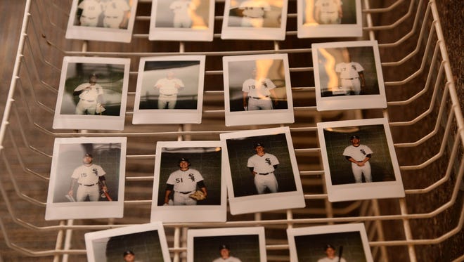 A detailed view of Polaroid portraits of the White Sox.