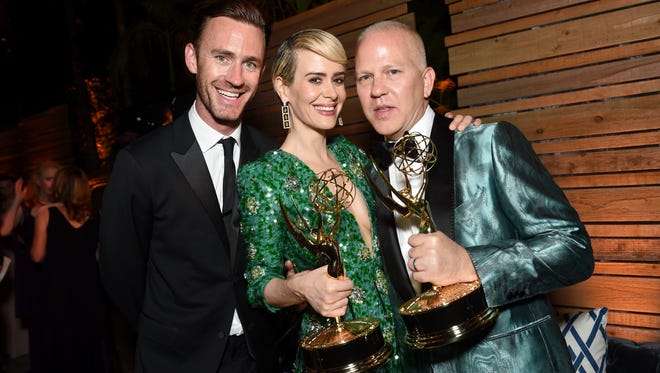 Writer John Gray, and winners Sarah Paulson and Ryan Murphy at the Fox, FX, National Geographic and Twentieth Century Fox Television's Emmy After Party at Vibiana.