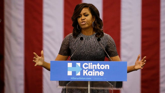 First lady Michelle Obama addresses the Arizona Democratic Party Early Vote rally at the Phoenix Convention Center on Thursday, Oct. 20, 2016. Obama is campaigning for Democratic presidential nominee Hillary Clinton.