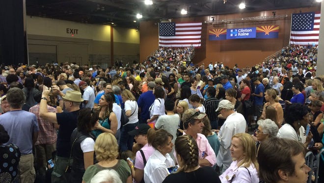 People gather at the Phoenix Convention Center on Oct. 20, 2016, to hear Michelle Obama speak in support of Hillary Clinton.