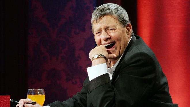 Jerry Lewis laughs while watching a performer during the 42nd annual Labor Day Telethon to benefit the Muscular Dystrophy Association at the South Point Hotel & Casino on Sept. 3, 2007, in Las Vegas.
