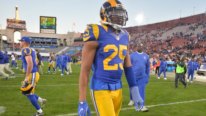 Dec 24, 2016; Los Angeles, CA, USA; Los Angeles Rams strong safety T.J. McDonald (25) walks off the field at the end of the Rams' 22-21 loss to the San Francisco 49ers at Los Angeles Memorial Coliseum. Mandatory Credit: Robert Hanashiro-USA TODAY Sports ORG XMIT: USATSI-268694 (Via OlyDrop)