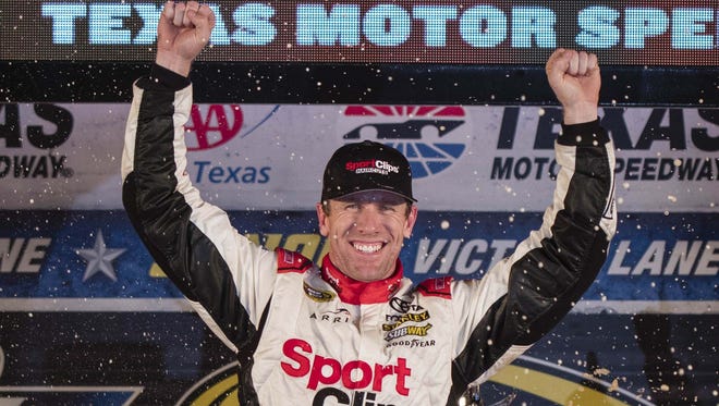 Carl Edwards celebrates his final Cup win - at Texas Motor Speedway last November.