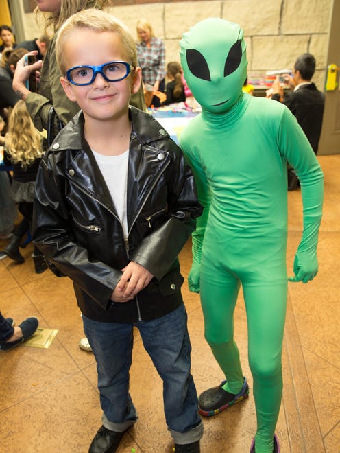Zach Imig, 6, (left) and Alex Imig, 10, both of western Des Moines, Friday, Oct. 23, 2015, during Halloween Hoopla at Raccoon River Park in West Des Moines.
