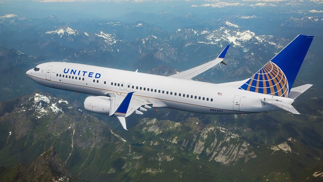 This file photo taken in July 2013 and provided by United Airlines shows a Boeing 737-800 with Split Scimitar Blended Winglets.
