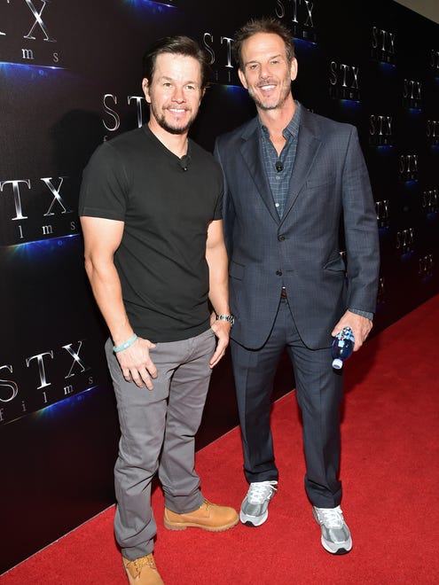 LAS VEGAS, NV - MARCH 28:  Actor Mark Wahlberg (L) and director Peter Berg at CinemaCon 2017 The State of the Industry: Past, Present and Future and STXfilms Presentation at The Colosseum at Caesars Palace during CinemaCon, the official convention of the National Association of Theatre Owners, on March 28, 2017 in Las Vegas, Nevada.  (Photo by Alberto E. Rodriguez/Getty Images for CinemaCon) ORG XMIT: 700024459 ORIG FILE ID: 659273140