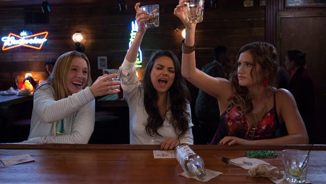 Kristen Bell (left), Mila Kunis and Kathryn Hahn throw it back in 'Bad Moms.'