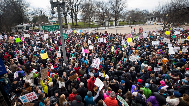 Thousands of people protest President Trump's immigration ban on citizens from seven majority-Muslim countries outside the White House in Washington, D.C., on Jan. 29, 2017.