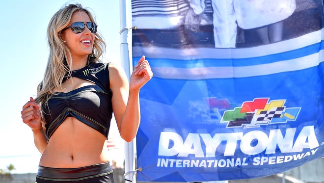 A Monster Energy model dances before the 2017 Daytona 500 at Daytona International Speedway.