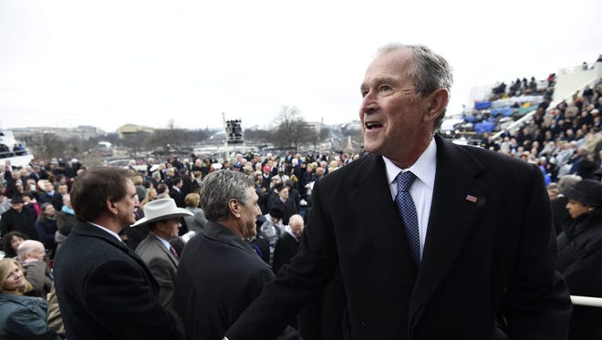 Former US President George W. Bush leaves after the presidential inauguration of Donald Trump as 45th President of the United States at the U.S. Capitol in Washington, D.C., January 20, 2017.