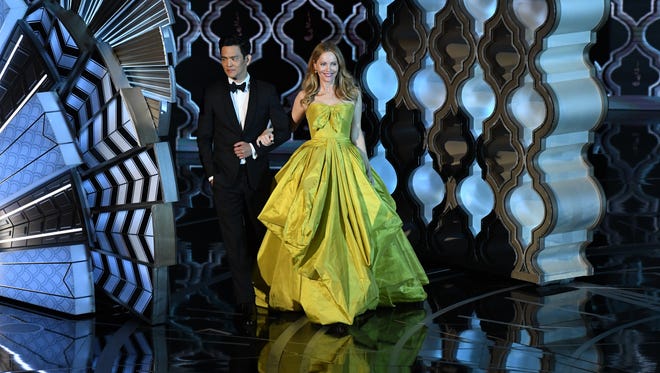 John Cho and Leslie Mann present a review of winners from scientific and technical awards ceremony during the 89th Academy Awards.