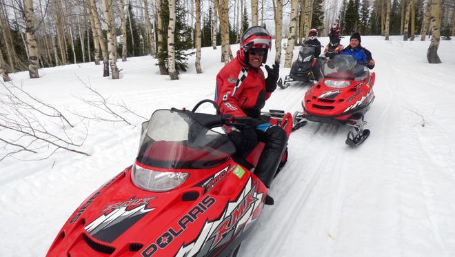 Richard Petty, front, on a snowmobiling trip in the Wyoming mountains. Petty owns a house, known as Winner’s Retreat, south of Yellowstone National Park  in Wyoming.