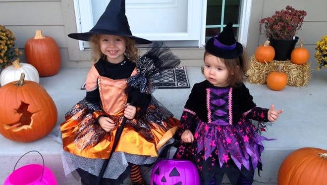 Little witches Brynn Mitchell, 4, and Paige Mitchell, 1, of Ankeny.