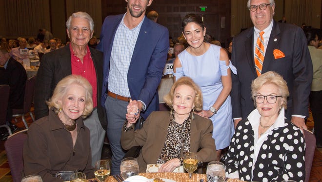From left, standing:  Board of Director Arthur Jacobson, Michael and Nicole Phelps, CEO/Executive Director John Thoresen.  Seated, from left:  Board of Director Nelda Linsk, Founder/Chairwoman Barbara Sinatra, Rita Vale.