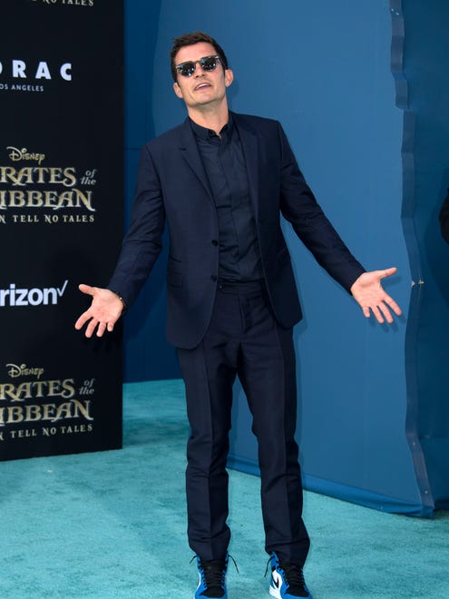 You got the sense Orlando Bloom was over it at the 'Pirates of the Caribbean: Dead Men Tell No Tales' premiere.