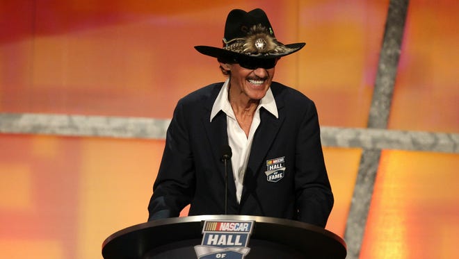 Richard Petty speaks during his induction to the NASCAR Hall of Fame in the inaugural class of 2010. Petty won seven NASCAR Cup championships in a driving career that spanned 35 years (1958-1992).