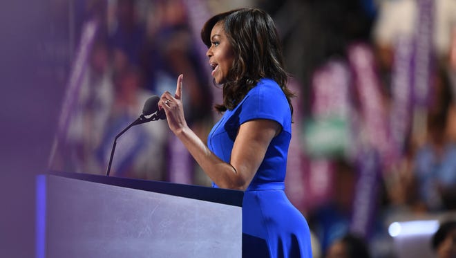 First lady Michelle Obama addresses delegates on day 1 of the Democratic National Convention at the Wells Fargo Center in Philadelphia on July 25, 2016.