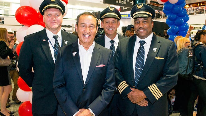 United Airlines CEO Oscar Munoz (front center) with United pilots at a send-off for members of the U.S. Olympic team at Houston Bush Intercontinental on Aug. 3, 2016.