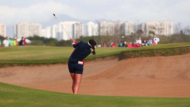 Aug 20, 2016; Rio de Gerina Piller of the United States hits out of a fairway bunker on the first in the final round of women's golf during the Rio 2016 Summer Olympic Games at Olympic Golf Course.
