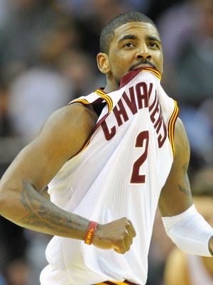 Cleveland Cavaliers guard Kyrie Irving reacts in the third quarter against the Detroit Pistons at Quicken Loans Arena.