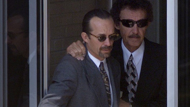 Kyle Petty, left, is comforted by his father, Richard, as the two arrive at the Sechrest Funeral Service on May 15, 2000 in High Point, N.C., before a memorial service for Adam Petty, Kyle's son. Adam had died in a crash on May 12 in Loudon, N.H.