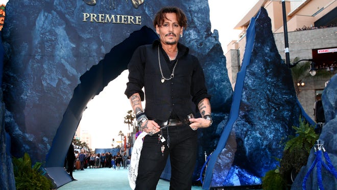 Johnny Depp attends the premiere of Disney's "Pirates Of The Caribbean: Dead Men Tell No Tales" at the Dolby Theatre in Hollywood.
