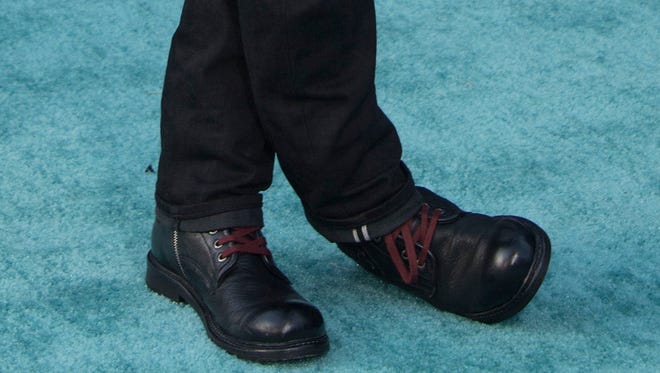 Johnny Depp's unusual premiere shoes and laces were noted.
