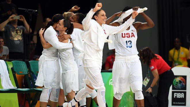 USA guard Diana Taurasi (12) reacts after beating Spain in the women's basketball gold medal match during the Rio 2016 Summer Olympic Games at Carioca Arena 1.