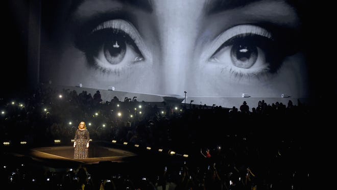 Singer Adele performs on stage during her North American tour at Staples Center on August 5, 2016, in Los Angeles.