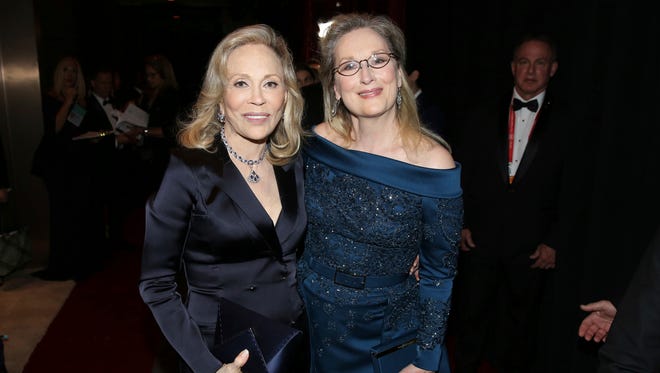 Faye Dunaway, left, and Meryl Streep appear backstage at the Oscars.