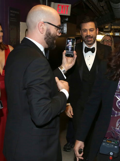 Jimmy Kimmel appears backstage at the Oscars in Los Angeles.