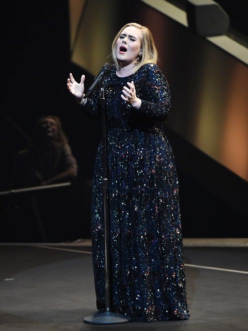 Adele performs during the final concert of her North American tour at Talking Stick Resort Arena on Nov. 21, 2016 in Phoenix.