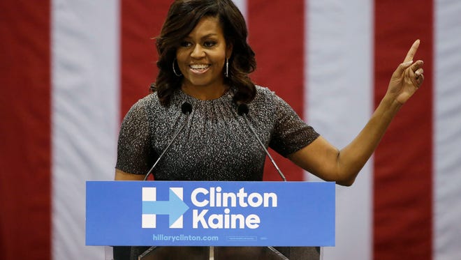 First lady Michelle Obama addresses the Arizona Democratic Party Early Vote rally at the Phoenix Convention Center on Thursday, Oct. 20, 2016. Obama is campaigning for Democratic presidential nominee Hillary Clinton.