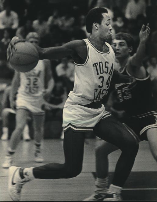Wauwatosa East's Tony Smith helped lead the Red Raiders to the state semifinals in 1986. Smith scored 16 points in the team's Class A semifinals. He was drafted by the Los Angeles Lakers in 1990 and played 10 seasons in the NBA.