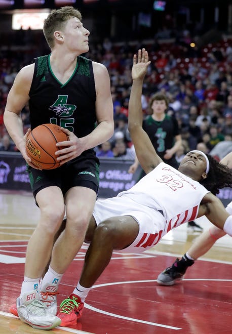 Almond-Bancroft High School's Ayden Phillips (15) against Abundant Life Christian School's Jimmitrius Davison (32) in a Division 5 semifinal game during the WIAA state boys basketball tournament on Friday, March 15, 2024 at the Kohl Center in Madison, Wis. Abundant Life defeated Almond-Bancroft 42-37.
Wm. Glasheen USA TODAY NETWORK-Wisconsin