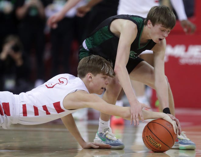 Abundant Life Christian School's Jonah Koon (3) against Almond-Bancroft High School's TJ Lamb (5) in a Division 5 semifinal game during the WIAA state boys basketball tournament on Friday, March 15, 2024 at the Kohl Center in Madison, Wis.
Wm. Glasheen USA TODAY NETWORK-Wisconsin