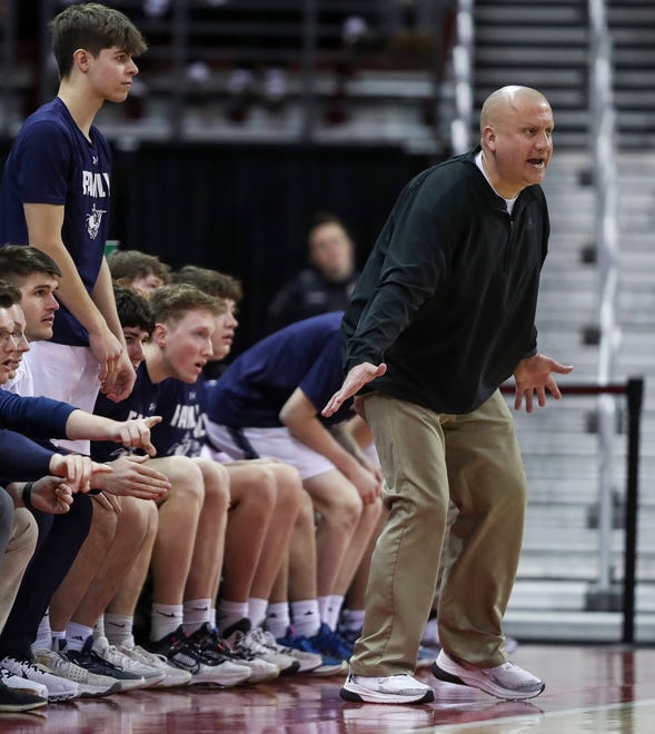 Columbus Catholic High School head coach Joe Konieczny instructs his defense against Solon Springs High School in a Division 5 semifinal game during the WIAA state boys basketball tournament on Friday, March 15, 2024 at the Kohl Center in Madison, Wis. Columbus Catholic won the game, 78-65.