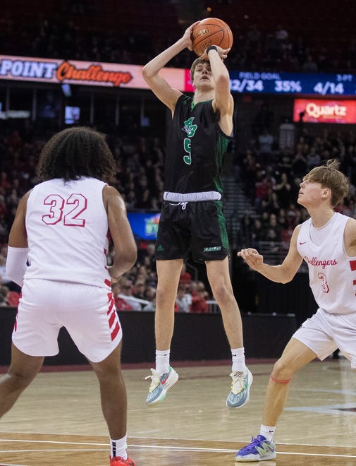 Almond-Bancroft High School's TJ Lamb (5) shoots the ball against Abundant Life Christian School in a Division 5 semifinal game during the WIAA state boys basketball tournament on Friday, March 15, 2024 at the Kohl Center in Madison, Wis. Abundant Life Christian won the game, 42-37.