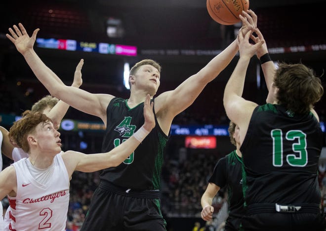 Almond-Bancroft High School's Ayden Phillips (15) fights for a rebound against Abundant Life Christian School in a Division 5 semifinal game during the WIAA state boys basketball tournament on Friday, March 15, 2024 at the Kohl Center in Madison, Wis. Abundant Life Christian won the game, 42-37.