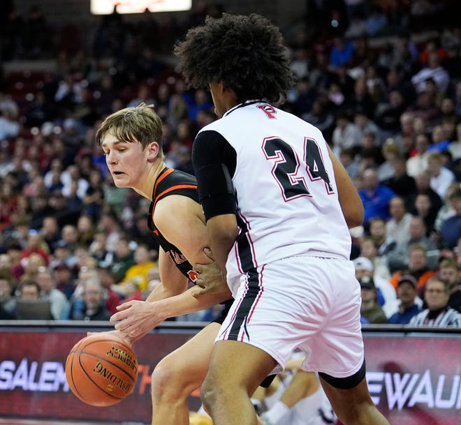 Pewaukee's Isaiah Robinson (24) guards West Salem's Kyle Hehli (3) during the first half of the WIAA Division 2 boys basketball state semifinal game on Friday March 15, 2024 at the Kohl Center in Madison, Wis.