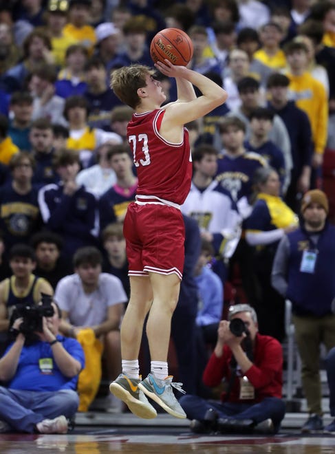 Neenah High School's Charlie Wunderlich (23) puts up an overtime three point shot against Arrowhead High 
school in a Division 1 semifinal game during the WIAA state boys basketball tournament on Friday, March 15, 2024 at the Kohl Center in Madison, Wis. Arrowhead defeated Neenah for 99-95 in four overtimes.
Wm. Glasheen USA TODAY NETWORK-Wisconsin