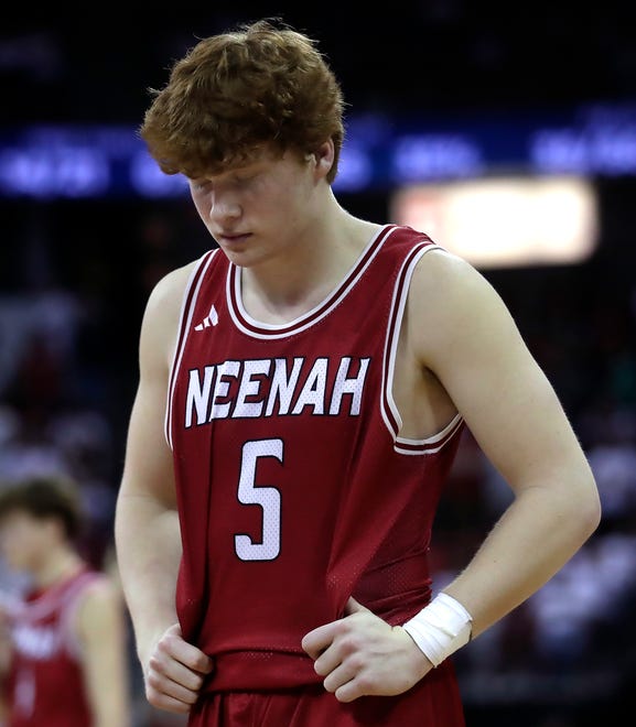 Neenah High School's Luke Jung (5) reacts as the final seconds tick off the clock against Arrowhead High School in a Division 1 semifinal game during the WIAA state boys basketball tournament on Friday, March 15, 2024 at the Kohl Center in Madison, Wis. Arrowhead defeated Neenah for 99-95 in four overtimes.
Wm. Glasheen USA TODAY NETWORK-Wisconsin