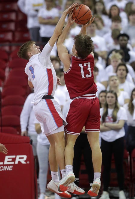 Arrowhead High School's Trey Resch (3) against Neenah High School's Grant Dean (13) in a Division 1 semifinal game during the WIAA state boys basketball tournament on Friday, March 15, 2024 at the Kohl Center in Madison, Wis. Arrowhead defeated Neenah for 99-95 in four overtimes.
Wm. Glasheen USA TODAY NETWORK-Wisconsin
