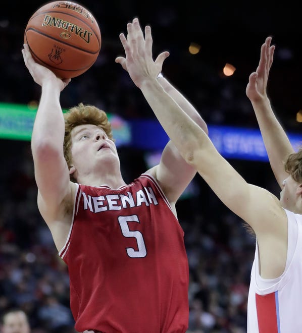 Neenah High School's Luke Jung (5) against Arrowhead High School in a Division 1 semifinal game during the WIAA state boys basketball tournament on Friday, March 15, 2024 at the Kohl Center in Madison, Wis. Arrowhead defeated Neenah for 99-95 in four overtimes.
Wm. Glasheen USA TODAY NETWORK-Wisconsin