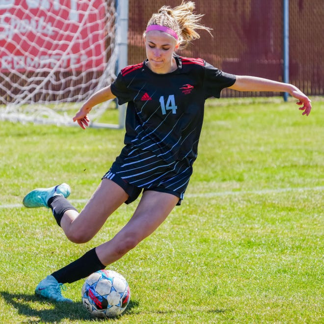 Arrowhead's Elise Gremban (14) lines up a kick during the match at home against Whitnall on Saturday, April 6, 2024.