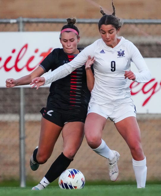 Muskego's Amanda Pankiewicz, left, and Waunakee's Claire Jaeger (9) battle for possession during the match at Muskego, Friday, April 19, 2024.